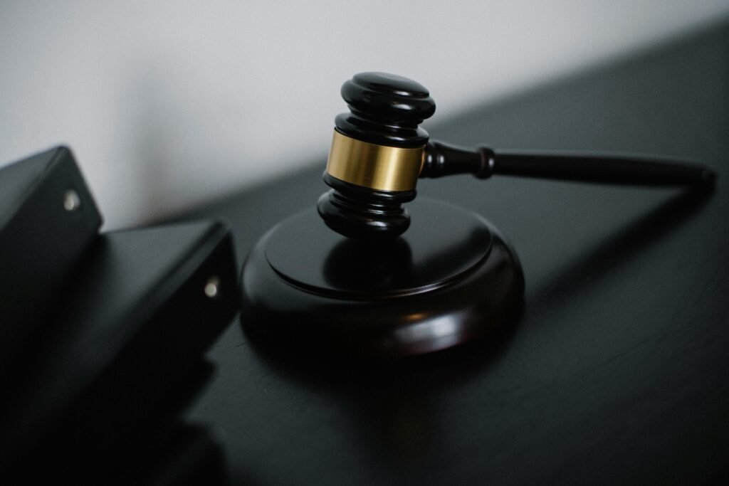 Judge's gavel on a desk, symbolizing the legal rulings and implications of using YouTube to MP3 converters.